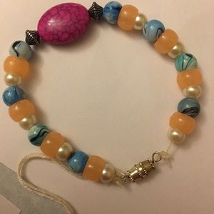 This bracelet is made of string